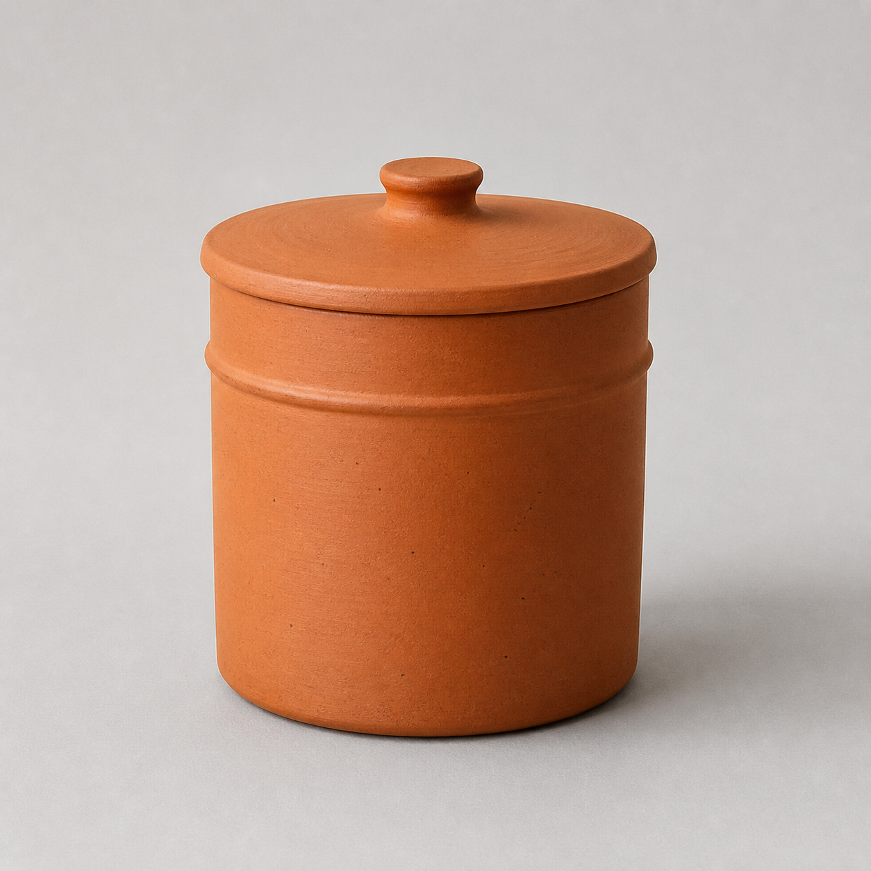 Fictional unbranded terracotta jar generated as an editorial reference image